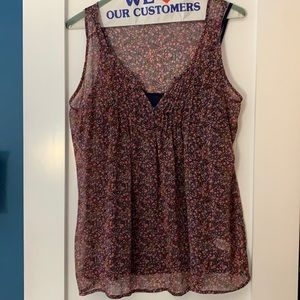 Cute Sleeveless sheer floral print top with navy blue tank underneath